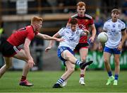 30 July 2021; Seán Jones of Monaghan in action against Lorcan Toal of Down during the EirGrid Ulster GAA Football U20 Championship Final match between Down and Monaghan at Athletic Grounds in Armagh. Photo by Piaras Ó Mídheach/Sportsfile