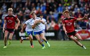 30 July 2021; Michael Hamill of Monaghan in action against Patrick McCarthy, left, and Danny Magill of Down during the EirGrid Ulster GAA Football U20 Championship Final match between Down and Monaghan at Athletic Grounds in Armagh. Photo by Piaras Ó Mídheach/Sportsfile