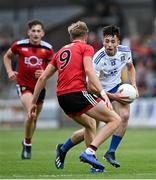 30 July 2021; Shane Slevin of Monaghan in action against Tom Close of Down during the EirGrid Ulster GAA Football U20 Championship Final match between Down and Monaghan at Athletic Grounds in Armagh. Photo by Piaras Ó Mídheach/Sportsfile