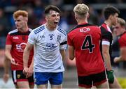 30 July 2021; Darragh McElearney of Monaghan celebrates scoring his side's first goal in front of Patrick McCarthy of Down during the EirGrid Ulster GAA Football U20 Championship Final match between Down and Monaghan at Athletic Grounds in Armagh. Photo by Piaras Ó Mídheach/Sportsfile