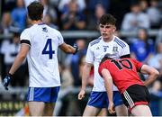 30 July 2021; Danny Magill of Down tangles with Ronan Boyle of Monaghan, off the ball, during the EirGrid Ulster GAA Football U20 Championship Final match between Down and Monaghan at Athletic Grounds in Armagh. Photo by Piaras Ó Mídheach/Sportsfile