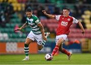 30 July 2021; Darragh Burns of St Patrick's Athletic in action against Lee Grace of Shamrock Rovers during the SSE Airtricity League Premier Division match between Shamrock Rovers and St Patrick's Athletic at Tallaght Stadium in Dublin. Photo by Eóin Noonan/Sportsfile