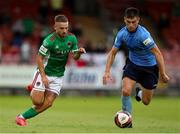 30 July 2021; Dylan McGlade of Cork City in action against Evan Weir of UCD during the SSE Airtricity League First Division match between Cork City and UCD at Turners Cross in Cork. Photo by Michael P Ryan/Sportsfile