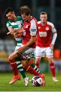 30 July 2021; Billy King of St Patrick's Athletic is tackled by Danny Mandroiu of Shamrock Rovers during the SSE Airtricity League Premier Division match between Shamrock Rovers and St Patrick's Athletic at Tallaght Stadium in Dublin. Photo by Eóin Noonan/Sportsfile