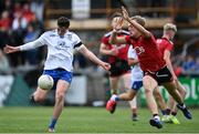 30 July 2021; Darragh Treanor of Monaghan shoots under pressure from Tom Close of Down during the EirGrid Ulster GAA Football U20 Championship Final match between Down and Monaghan at Athletic Grounds in Armagh. Photo by Piaras Ó Mídheach/Sportsfile