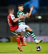 30 July 2021; Lee Grace of Shamrock Rovers is tackled by John Mountney of St Patrick's Athletic during the SSE Airtricity League Premier Division match between Shamrock Rovers and St Patrick's Athletic at Tallaght Stadium in Dublin. Photo by Eóin Noonan/Sportsfile