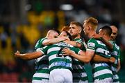30 July 2021; Roberto Lopes of Shamrock Rovers, 4, celebrates with team-mates after scoring his side's second goal during the SSE Airtricity League Premier Division match between Shamrock Rovers and St Patrick's Athletic at Tallaght Stadium in Dublin. Photo by Eóin Noonan/Sportsfile