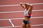 31 July 2021; Jessie Knight of Great Britain reacts after falling at the first hurdle during the women's 400 metres hurdles heats at the Olympic Stadium during the 2020 Tokyo Summer Olympic Games in Tokyo, Japan. Photo by Brendan Moran/Sportsfile