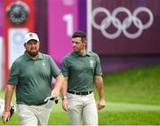 31 July 2021; Shane Lowry, left, and Rory McIlroy of Ireland walk away from the first tee box after teeing off during round 3 of the men's individual stroke play at the Kasumigaseki Country Club during the 2020 Tokyo Summer Olympic Games in Kawagoe, Saitama, Japan. Photo by Ramsey Cardy/Sportsfile