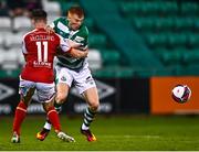 30 July 2021; Rory Gaffney of Shamrock Rovers in action against Jay McClelland of St Patrick's Athletic during the SSE Airtricity League Premier Division match between Shamrock Rovers and St Patrick's Athletic at Tallaght Stadium in Dublin. Photo by Eóin Noonan/Sportsfile