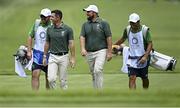 31 July 2021; Rory McIlroy and Shane Lowry of Ireland with their caddies Alan Lowry, left, and Harry Diamond, right, during round 3 of the men's individual stroke play at the Kasumigaseki Country Club during the 2020 Tokyo Summer Olympic Games in Kawagoe, Saitama, Japan. Photo by Ramsey Cardy/Sportsfile