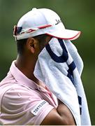 31 July 2021; Hideki Matsuyama of Japan uses a towel to wipe his face during round 3 of the men's individual stroke play at the Kasumigaseki Country Club during the 2020 Tokyo Summer Olympic Games in Kawagoe, Saitama, Japan. Photo by Ramsey Cardy/Sportsfile