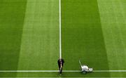 31 July 2021; Groundsman Enda Colfer places a sideline flag as he refreshes the white line before the Ulster GAA Football Senior Championship Final match between Monaghan and Tyrone at Croke Park in Dublin. Photo by Ray McManus/Sportsfile