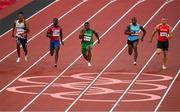31 July 2021; Enoch Adegoke of Nigeria, centre, leads during his heat in round one of the men's 100 metres ahead of, from left, Zharnel Hughes of Great Britain, Trayvon Brommel of USA, Samson Colebrooke of Bahamas and Silvan Wicki of Switzerland at the Olympic Stadium during the 2020 Tokyo Summer Olympic Games in Tokyo, Japan. Photo by Brendan Moran/Sportsfile