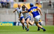 31 July 2021; Jamie Barron of Waterford in action against Jason Forde of Tipperary during the GAA Hurling All-Ireland Senior Championship Quarter-Final match between Tipperary and Waterford at Pairc Ui Chaoimh in Cork. Photo by Daire Brennan/Sportsfile