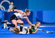31 July 2021; Katie Mullan of Ireland in action against Hollie Pearne-Webb of Great Britain during the women's pool A group stage match between Great Britain and Ireland at the Oi Hockey Stadium during the 2020 Tokyo Summer Olympic Games in Tokyo, Japan. Photo by Stephen McCarthy/Sportsfile