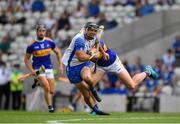 31 July 2021; Patrick Curran of Waterford in action against Padraic Maher of Tipperary during the GAA Hurling All-Ireland Senior Championship Quarter-Final match between Tipperary and Waterford at Pairc Ui Chaoimh in Cork. Photo by Daire Brennan/Sportsfile