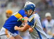 31 July 2021; Kieran Bennett of Waterford in action against Michael Breen of Tipperary during the GAA Hurling All-Ireland Senior Championship Quarter-Final match between Tipperary and Waterford at Pairc Ui Chaoimh in Cork. Photo by Eóin Noonan/Sportsfile