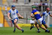 31 July 2021; Austin Gleeson of Waterford in action against Noel McGrath of Tipperary during the GAA Hurling All-Ireland Senior Championship Quarter-Final match between Tipperary and Waterford at Pairc Ui Chaoimh in Cork. Photo by Daire Brennan/Sportsfile