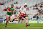 31 July 2021; Conor Grogan of Tyrone gets away from David Kenny of Mayo on his way to scoring his side's first goal during the Nicky Rackard Cup Final match between Tyrone and Mayo at Croke Park in Dublin.  Photo by Harry Murphy/Sportsfile