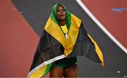 31 July 2021; Elaine Thompson-Herah of Jamaica celebrates after winning the women's 100 metres final in a new olympic record time at the Olympic Stadium during the 2020 Tokyo Summer Olympic Games in Tokyo, Japan. Photo by Brendan Moran/Sportsfile