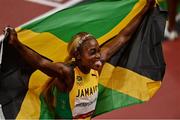 31 July 2021; Elaine Thompson-Herah of Jamaica celebrates after winning the women's 100 metres final in a new olympic record time on day eight of the Olympic Stadium during the 2020 Tokyo Summer Olympic Games in Tokyo, Japan. Photo by Brendan Moran/Sportsfile