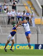 31 July 2021; Peter Hogan of Waterford in action against Noel McGrath of Tipperary during the GAA Hurling All-Ireland Senior Championship Quarter-Final match between Tipperary and Waterford at Pairc Ui Chaoimh in Cork. Photo by Daire Brennan/Sportsfile