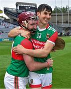 31 July 2021; Cathal Freeman, left, and Adrian Philips of Mayo celebrate after the Nicky Rackard Cup Final match between Tyrone and Mayo at Croke Park in Dublin.  Photo by Ray McManus/Sportsfile