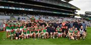 31 July 2021; Mayo players and officials celebrate after being presented with the cup following the Nicky Rackard Cup Final match between Tyrone and Mayo at Croke Park in Dublin. Photo by Ray McManus/Sportsfile