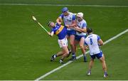31 July 2021; Alan Flynn of Tipperary in action against Conor Prunty, left, and Shane McNulty of Waterford during the GAA Hurling All-Ireland Senior Championship Quarter-Final match between Tipperary and Waterford at Pairc Ui Chaoimh in Cork. Photo by Daire Brennan/Sportsfile