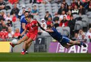 31 July 2021; Niall Sludden of Tyrone scores a point despite the attention of Karl O'Connell of Monaghan during the Ulster GAA Football Senior Championship Final match between Monaghan and Tyrone at Croke Park in Dublin. Photo by Harry Murphy/Sportsfile