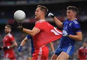 31 July 2021; Kieran McGeary of Tyrone is tackled by Aaron Mulligan of Monaghan during the Ulster GAA Football Senior Championship Final match between Monaghan and Tyrone at Croke Park in Dublin. Photo by Ray McManus/Sportsfile