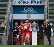 31 July 2021; Tyrone captain Pádraig Hampsey leads the team past the Anglo Celt Cup before the Ulster GAA Football Senior Championship Final match between Monaghan and Tyrone at Croke Park in Dublin. Photo by Harry Murphy/Sportsfile