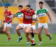 31 July 2021; Adam Walsh-Murphy of Cork in action against Cathal Flynn and Morgan Tynan of Offaly during the 2021 EirGrid GAA All-Ireland Football U20 Championship Semi-Final match between Cork and Offaly at MW Hire O'Moore Park in Portlaoise, Laois. Photo by Matt Browne/Sportsfile