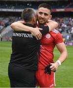 31 July 2021; Pádraig Hampsey of Tyrone and Tyrone joint-manager Brian Dooher embrace after the Ulster GAA Football Senior Championship Final match between Monaghan and Tyrone at Croke Park in Dublin. Photo by Harry Murphy/Sportsfile