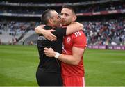 31 July 2021; Pádraig Hampsey of Tyrone and Tyrone joint-manager Brian Dooher embrace after the Ulster GAA Football Senior Championship Final match between Monaghan and Tyrone at Croke Park in Dublin. Photo by Harry Murphy/Sportsfile