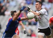 31 July 2021; Tyrone goalkeeper Niall Morgan clears the ball away from Dessie Ward of Monaghan late in the game during the Ulster GAA Football Senior Championship Final match between Monaghan and Tyrone at Croke Park in Dublin. Photo by Harry Murphy/Sportsfile