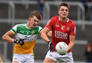 31 July 2021; Brian Hayes of Cork in action against Rory Egan of Offaly during the 2021 EirGrid GAA All-Ireland Football U20 Championship Semi-Final match between Cork and Offaly at MW Hire O'Moore Park in Portlaoise, Laois. Photo by Matt Browne/Sportsfile