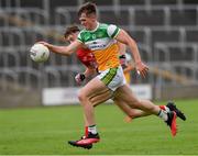 31 July 2021; Cathal Donoghue of Offaly in action against Darragh Holland of Cork during the 2021 EirGrid GAA All-Ireland Football U20 Championship Semi-Final match between Cork and Offaly at MW Hire O'Moore Park in Portlaoise, Laois. Photo by Matt Browne/Sportsfile