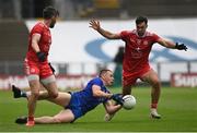 31 July 2021; Micheál Bannigan of Monaghan in action against Matthew Donnelly, left, and Conor McKenna of Tyrone during the Ulster GAA Football Senior Championship Final match between Monaghan and Tyrone at Croke Park in Dublin. Photo by Harry Murphy/Sportsfile