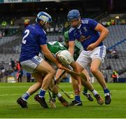 31 July 2021; Mark Slevin of Fermanagh is tackled by Dominic Crudden and Neasan Neary of Cavan during the Lory Meagher Cup Final match between Fermanagh and Cavan at Croke Park in Dublin.  Photo by Ray McManus/Sportsfile