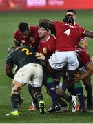 31 July 2021; British and Irish Lions players, from left, Courtney Lawes, Tom Curry and Maro Itoje drive against Bongi Mbonambi during the second test of the British and Irish Lions tour match between South Africa and British and Irish Lions at Cape Town Stadium in Cape Town, South Africa. Photo by Ashley Vlotman/Sportsfile