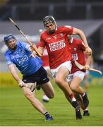 31 July 2021; Darragh Fitzgibbon of Cork in action against Conor Burke of Dublin during the GAA Hurling All-Ireland Senior Championship Quarter-Final match between Dublin and Cork at Semple Stadium in Thurles, Tipperary. Photo by David Fitzgerald/Sportsfile