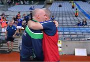31 July 2021; The two mannagers, Fermanagh manager Joe Baldwin, left, and Cavan manager Ollie Bellew, embrace after the Lory Meagher Cup Final match between Fermanagh and Cavan at Croke Park in Dublin.  Photo by Ray McManus/Sportsfile