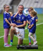 31 July 2021; Kevin Conneely of Cavan with Isobel, eight years, Sadhph, 1, Aibhlinn, 6, and Sophie, 4, after the Lory Meagher Cup Final match between Fermanagh and Cavan at Croke Park in Dublin.  Photo by Ray McManus/Sportsfile