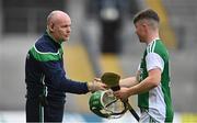 31 July 2021; Fermanagh manager Joe Baldwin congratulates hat-trick hero Tom Keenan of Fermanagh after he is substituted during the Lory Meagher Cup Final match between Fermanagh and Cavan at Croke Park in Dublin.  Photo by Sam Barnes/Sportsfile
