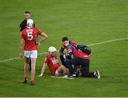 31 July 2021; Luke Meade of Cork receives medical attention for an injury during the GAA Hurling All-Ireland Senior Championship Quarter-Final match between Dublin and Cork at Semple Stadium in Thurles, Tipperary. Photo by Piaras Ó Mídheach/Sportsfile
