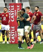 31 July 2021; Lukhanyo Am of South Africa, right, celebrates with team-mate Faf de Klerk after scoring a try during the second test of the British and Irish Lions tour match between South Africa and British and Irish Lions at Cape Town Stadium in Cape Town, South Africa. Photo by Ashley Vlotman/Sportsfile