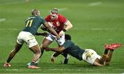 31 July 2021; Stuart Hogg of the British and Irish Lions tackled by Makazole Mapimpi and Lukhanyo Am of South Africa during the second test of the British and Irish Lions tour match between South Africa and British and Irish Lions at Cape Town Stadium in Cape Town, South Africa. Photo by Ashley Vlotman/Sportsfile