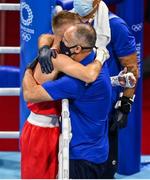 1 August 2021; Kurt Walker of Ireland with USA coach Billy Walsh after his men's featherweight quarter-final bout with Duke Ragan of USA at the Kokugikan Arena during the 2020 Tokyo Summer Olympic Games in Tokyo, Japan. Photo by Brendan Moran/Sportsfile